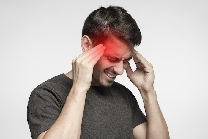 Explain the causes, types, signs, and treatments of headaches.